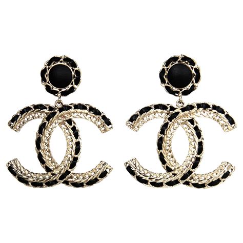 black and gold chanel earrings|chanel black earrings price.